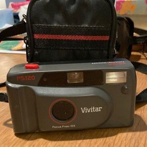 Vintage Collection of 70’s Cameras, Cases and instructions.